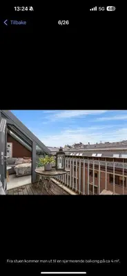 a picture of a balcony with a view of a building at Munkegata 30 Trondheim in Trondheim