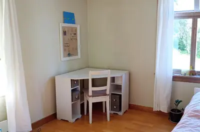 a desk with a chair in a room at Room2B in Bergen