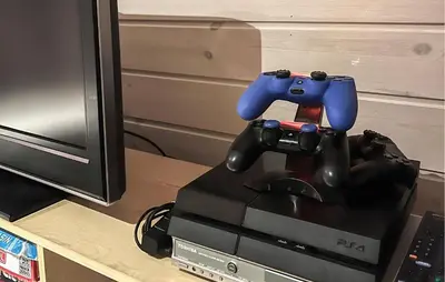 a video game controller sitting on top of a router at Gorgeous Home In Rauland With Sauna in Rauland