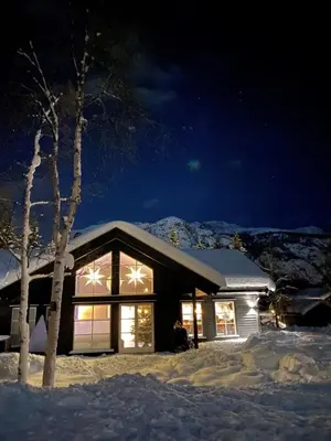 a house covered in snow at night at New cottage near the city center and ski slope in Hemsedal