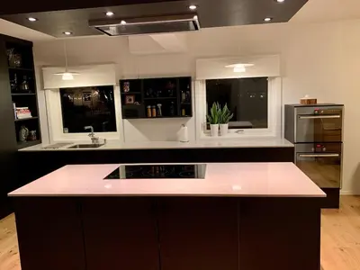 a kitchen with a black and white counter top at Large Architect Designed Home in City Centre in Hamar