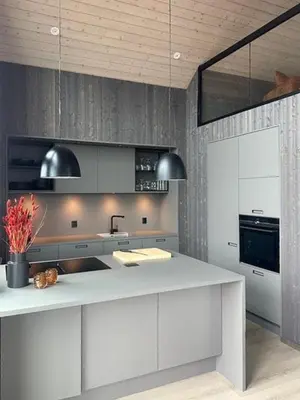 a kitchen with a white counter and a sink at Modern Cabin With Archipelago Views in Bremnes