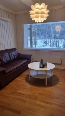 a living room with a couch and a coffee table at Sentrumsvegen 28, GOL in Gol
