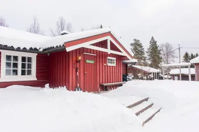 a red house with snow on the ground in front at Tveitehaug cabin, 3-4 bedroom cabin close to ski center in Ål