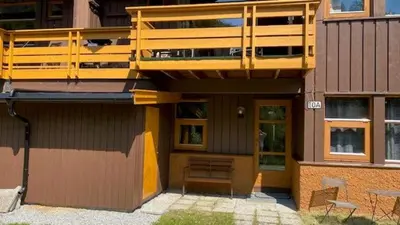 a building with a balcony on top of it at Actif 413 - apartment close to Ål Ski Centre in Ål