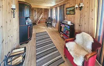 an overhead view of a living room in a cabin at 4 Bedroom Stunning Home In Tuddal in Tuddal