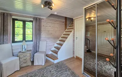 a room with a staircase and a mirror at Stunning Home In Vikebygd With House A Mountain View in Vikebygd