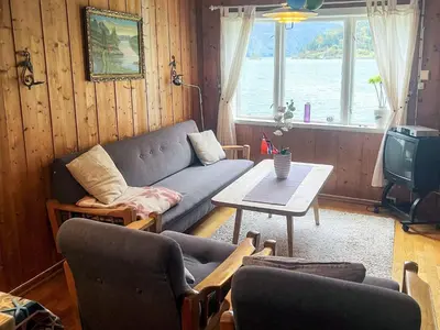 a living room with a couch and a table at 3 person holiday home in STRYN-By Traum in Stryn