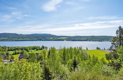 an estate with a view of a lake at Idyllic cottage with a view, close to Gardermoen Airport in Hurdal