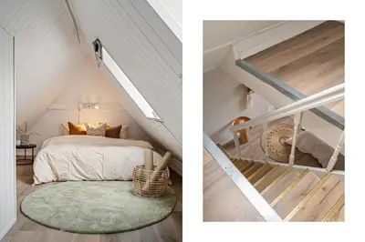 a attic bedroom with a bed and a staircase at Charming apt in the centre of Bergen in Bergen