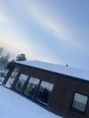 a building with snow on the ground at New cabin in beautiful surroundings in Oppdal