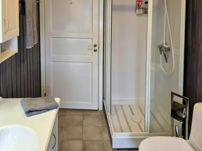a bathroom with a shower and a sink at Mountain Gem With Ski In And Out At Golsfjellet in Gol
