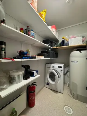 a laundry room with a washer and a washing machine at Cozy apartment in Vestlia, Geilo in Geilo