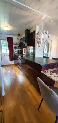 a kitchen with a large counter top in a room at Flora in Lillehammer