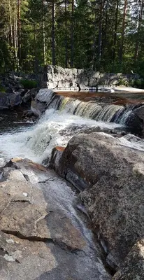 a stream of water in a river with rocks at Cabin in Kongsberg, Jondalen in Kongsberg