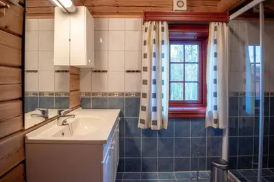 a bathroom with a sink and a window at Lisetra 716B in Trysil