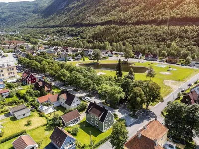 an aerial view of a small town in the mountains at Tveitopark Apartments B in Rjukan