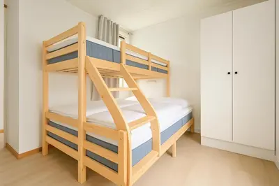 a bunk bed room with two bunk beds at Central & Quiet by Bryggen - Norwegians Minimum Age 25 in Bergen