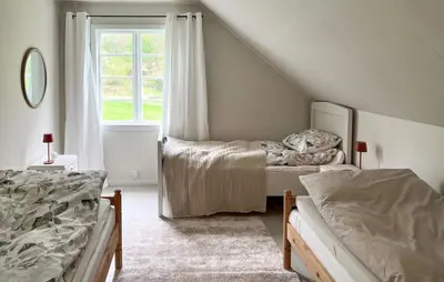 a bedroom with two beds and a window at Gorgeous Home In Eikesdal - N28170 in Verma