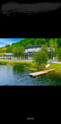 a small dock in the middle of a body of water at 