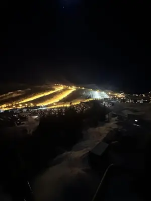 a view of a parking lot at night at Ski in ski out apartment with sauna in Hemsedal