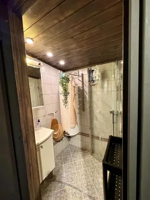 a bathroom with a shower and a sink at Charming cabin with lovely views at Geilo in Geilo