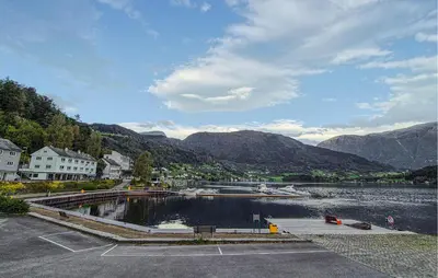 a view of a body of water with mountains at Awesome Apartment In Ulvik With House Sea View in Ulvik