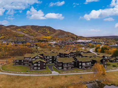 an aerial view of a subdivision of houses at Geilotunet Apartment - close to everything, free parking in garage, EV in Geilo