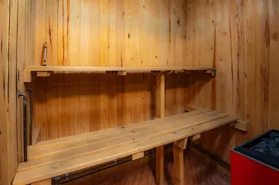 a wooden sauna with a bench on the wall at Trysilfjellet Nord 267 in Trysil