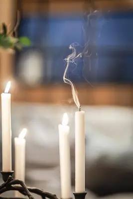 a group of candles with smoke coming out of them at Nyørk Chalet, Hemsedal in Hemsedal