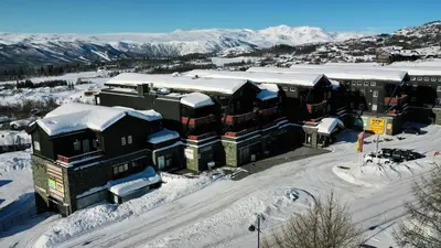 an aerial view of a hotel in the snow at Hjemmekoselig Toppleilighet I Sentrum in Beitostøl