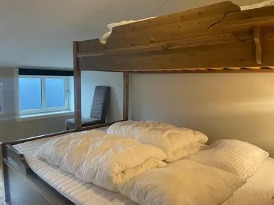 two pillows on top of a bunk bed at Hjemmekoselig Toppleilighet I Sentrum in Beitostøl