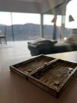 a wooden tray sitting on a table in a living room at New Cabin With Panoramic Views At Hardangervidda in Eidfjord