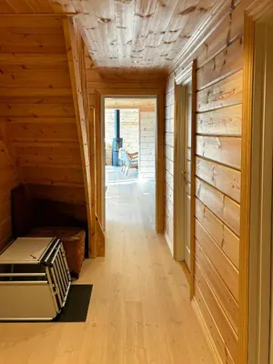 a hallway of a house with wooden walls at Mountain Cabin With Panoramic Views In Valdres in Etnedal