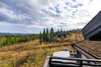 a view of a house from the porch of a house at Mosetra2038 by Vacationtrysil in Trysil