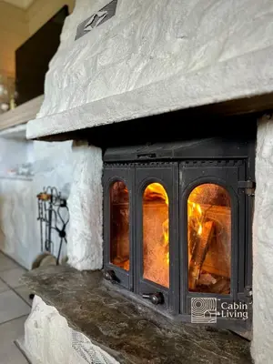 a brick oven with a fire inside of it at Spacious cabin in Hemsedal with sauna, near slopes in Hemsedal