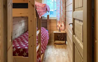a small room with a bunk bed in a house at Gorgeous Home In Bjorli With Wifi in Bjorli