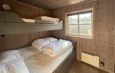 a small room with two beds and a window at Stunning Home In Gålå With Wifi in Gålå