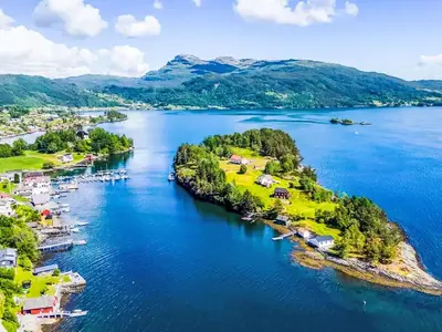 an aerial view of a small island in a lake at Holiday Home Holmen by Interhome in Strandebarm