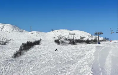 a person skiing down a snow covered ski slope at 3 Bedroom Stunning Home In Hovden I Setesdal in Hovden
