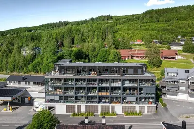 an aerial view of a hotel with a mountain at Nice apartment in the center of Trysil 402 in Trysil