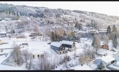 an aerial view of a town in the snow at New house in the center of Trysil in Trysil