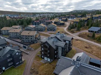 an aerial view of a town with houses and a road at Fageråsen 963 by Vacation Trysil in Trysil
