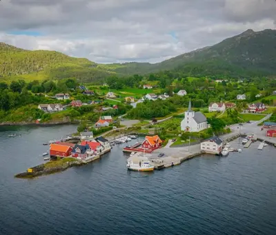 an aerial view of a small harbor with boats in the water at Eldur Seaside Cabin in Stavang