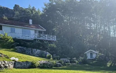 a house on the side of a hill at 1 Bedroom Cozy Home In Førde I Hordaland in Erve