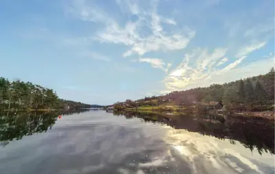 a view of a river with trees on the sides at 1 Bedroom Cozy Home In Førde I Hordaland in Erve