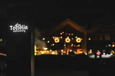a sign in front of a house at night at Hemsedal ski in ski out, modern comfort by the slopes in Hemsedal