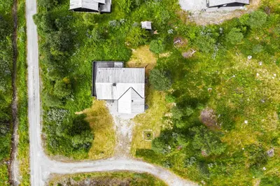 an overhead view of a white house in the grass at Fjellkos, mountain cabin in Gol in Gol
