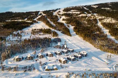 an aerial view of a resort in the snow at Norefri - Norefjell in Noresund