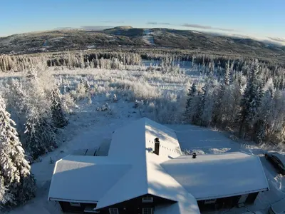 an aerial view of a building in the snow at Jantelaaven in Trysil